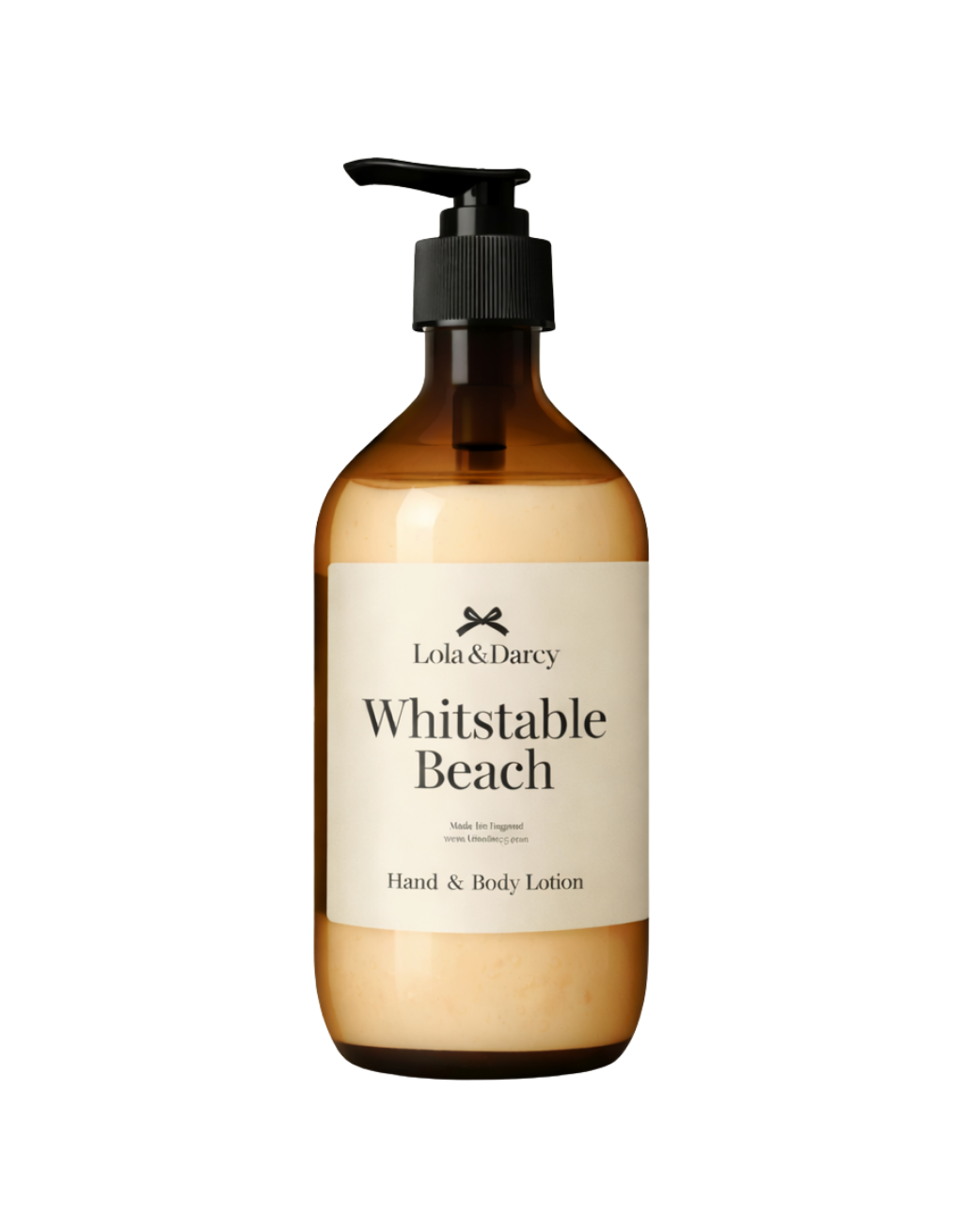 Brown bottle of 'Whitstable Beach' hand & body lotion with pump on a white background