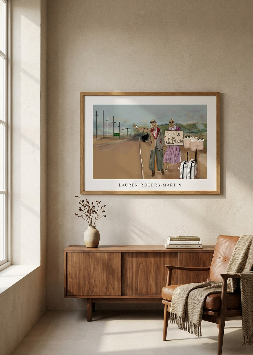 Framed artwork on a wall - Take us to whitstable poster print in a room with a wooden cabinet and chair.