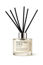 Diffuser bottle labeled 'Whitstable Love' with black reeds on a white background