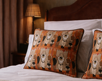 KISS MY cushion styled on a bed – The LRM Studio interior